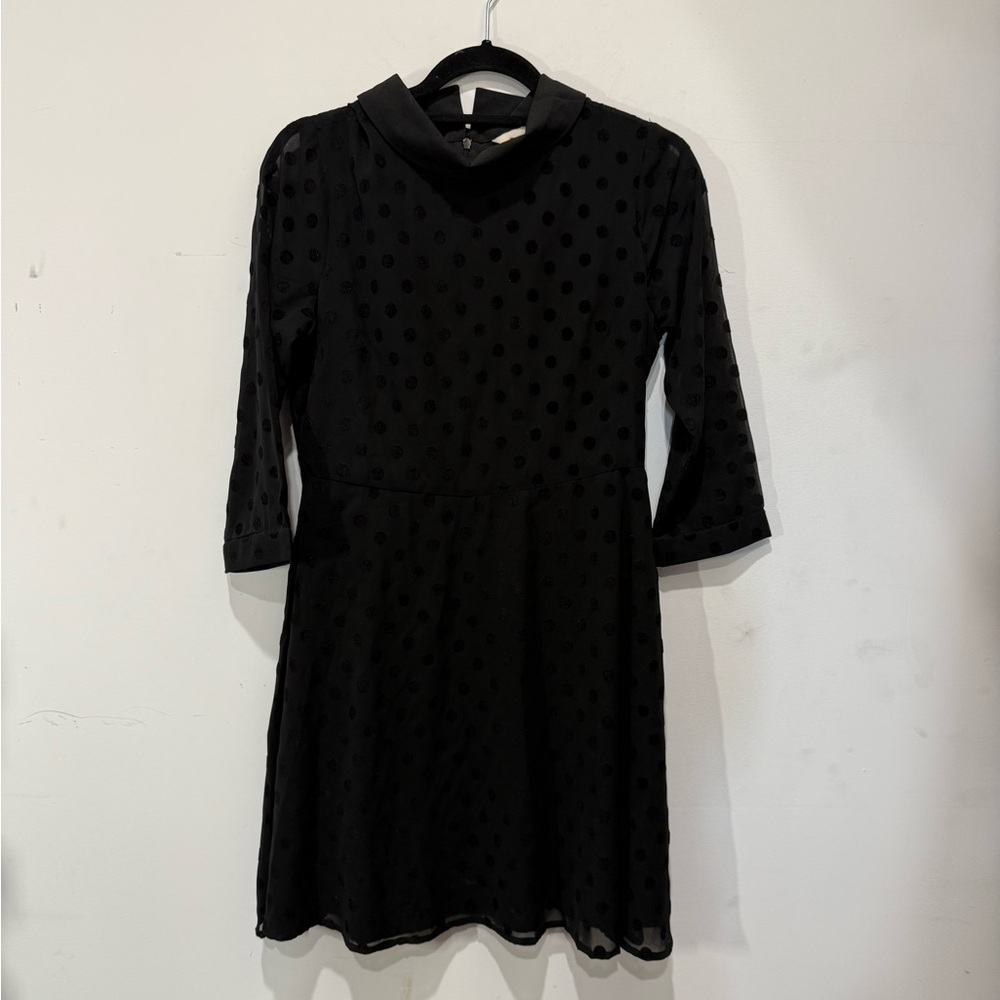 Umi Black Garment with Cream Label